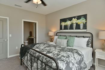 Primary bedroom with ceiling fan 